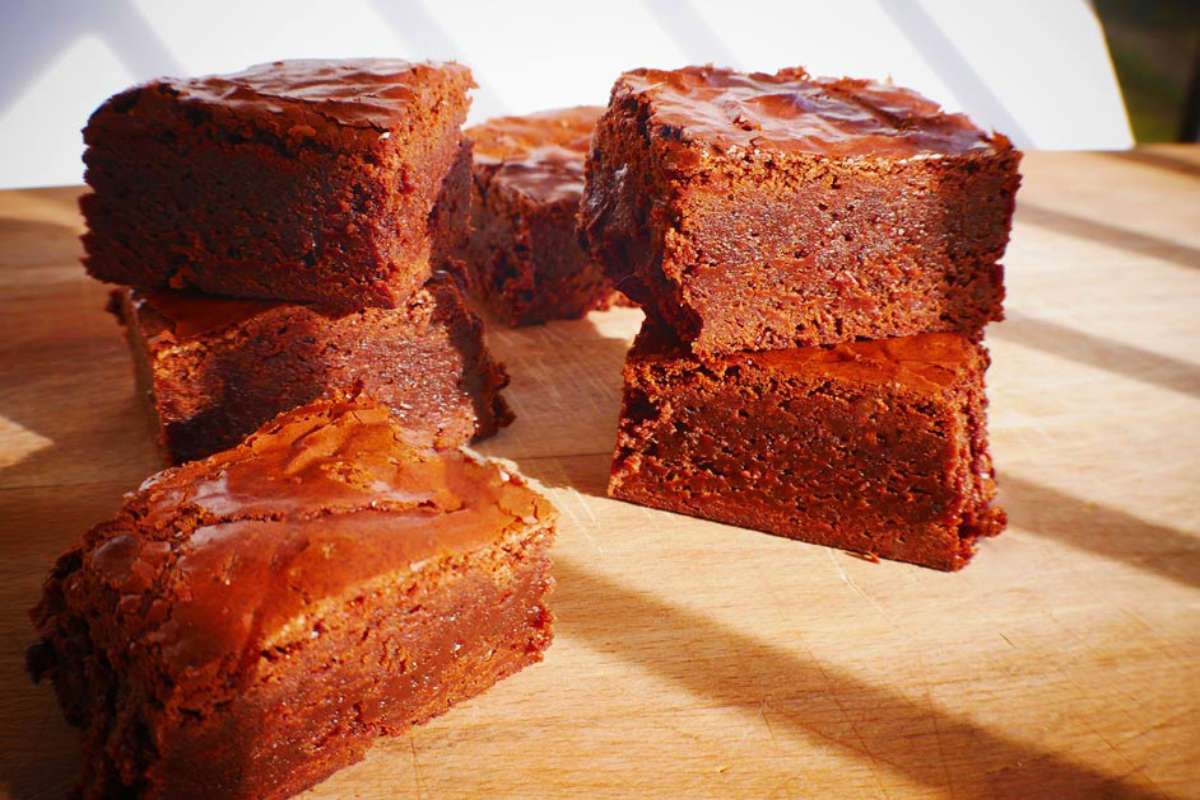 Le Cordon Bleu Brownies. Sliced and served on wooden board.