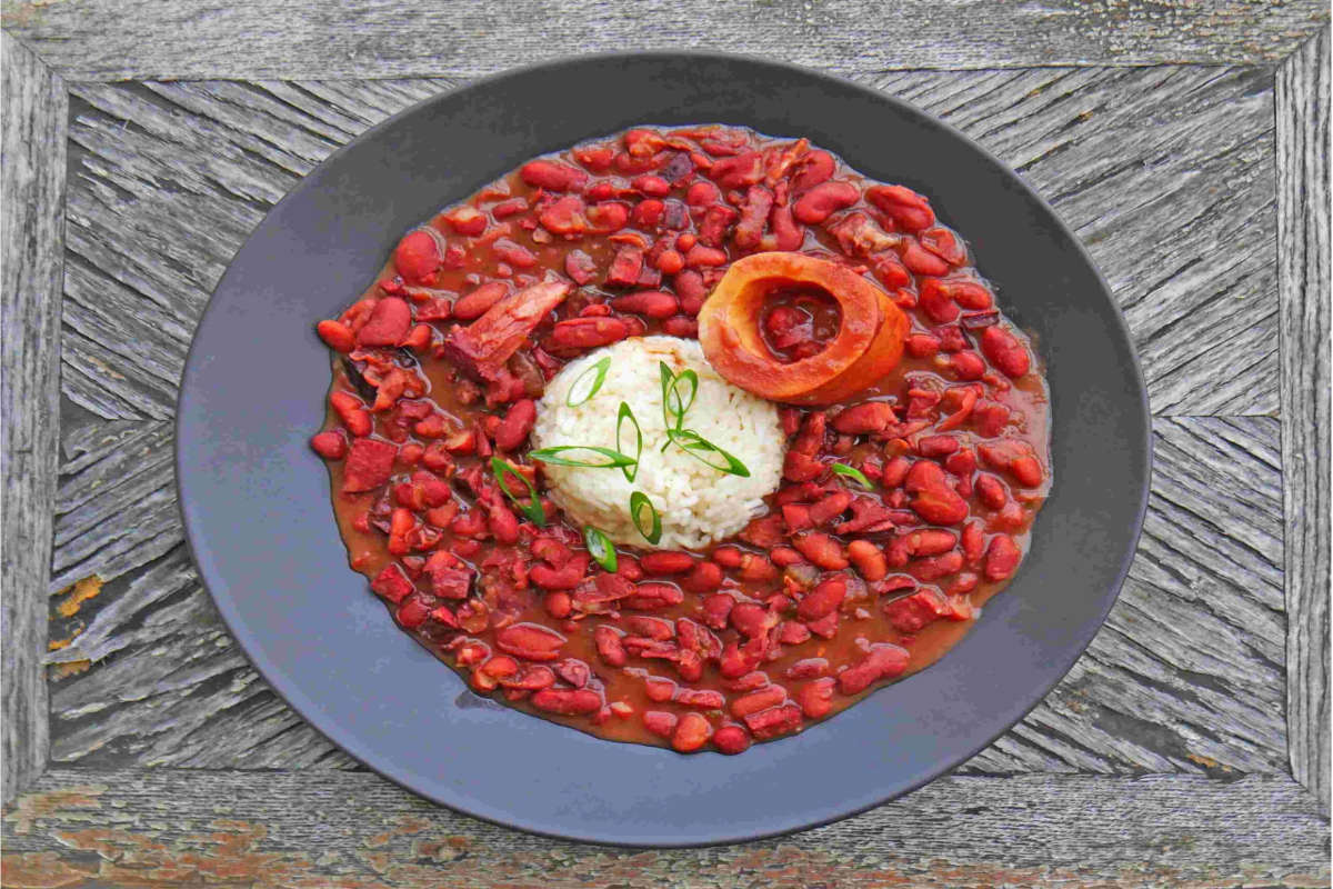 Red beans and rice with ham hocks plated.