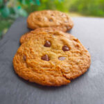 Chocolate Chip Cookies on a black chalk plate